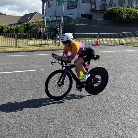 LaRee Holcomb racing her time trial bike